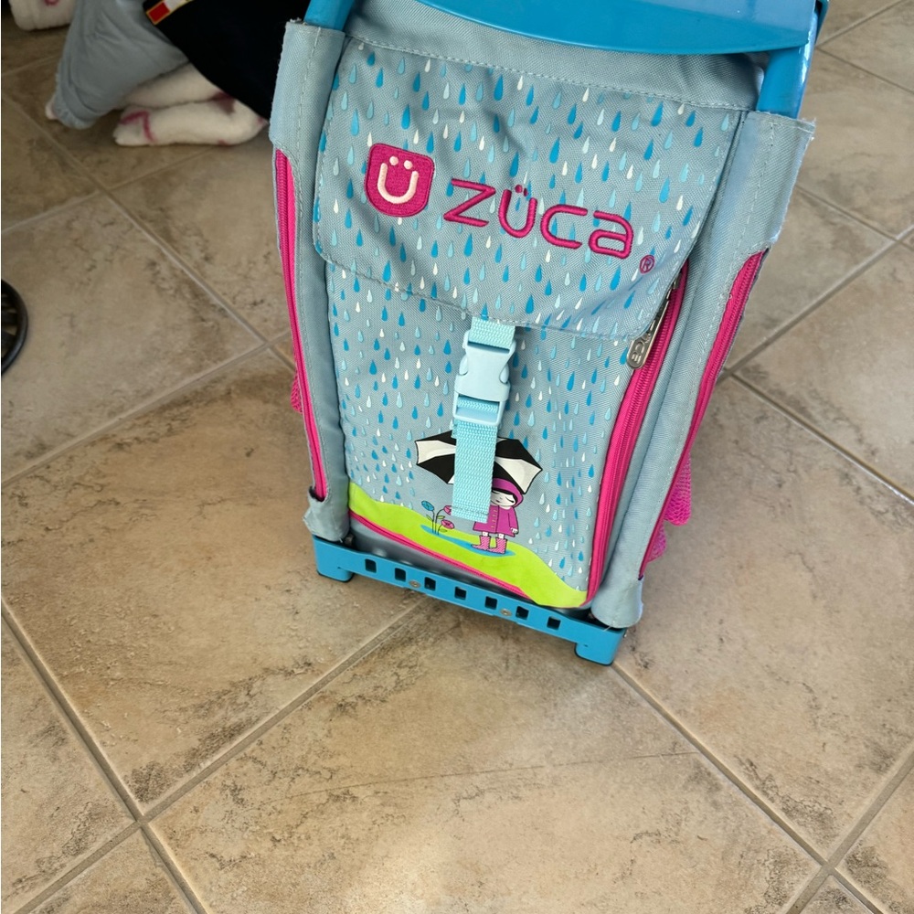 Rolling bag  for ice skating shoes or else for school also